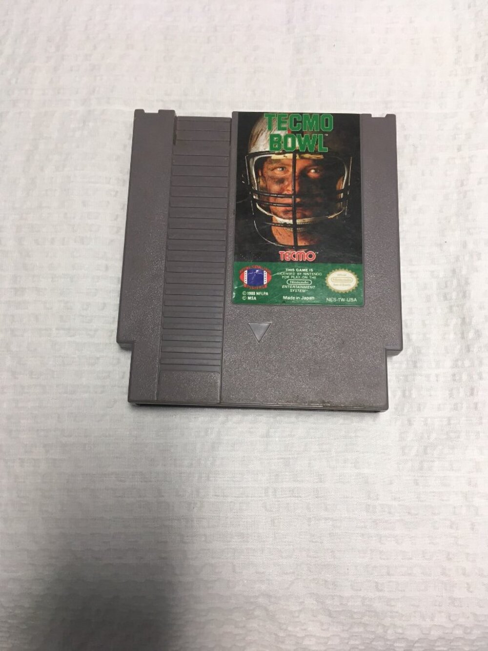 Nintendo NES Tecmo Bowl game cartridge